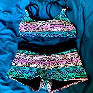 A two piece bright colored bathing suit.